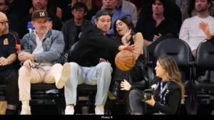 Justin Herbert Protects Madison Beer at Lakers Game