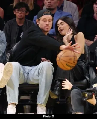 Justin Herbert Protects Madison Beer at Lakers Game